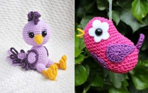 Two amigurumi bird toys: the left is purple with yellow feet and a tuft on its head; the right is pink and purple with a white flower on its head, hanging from a string. Perfect crochet patterns for adding charm to your decor!