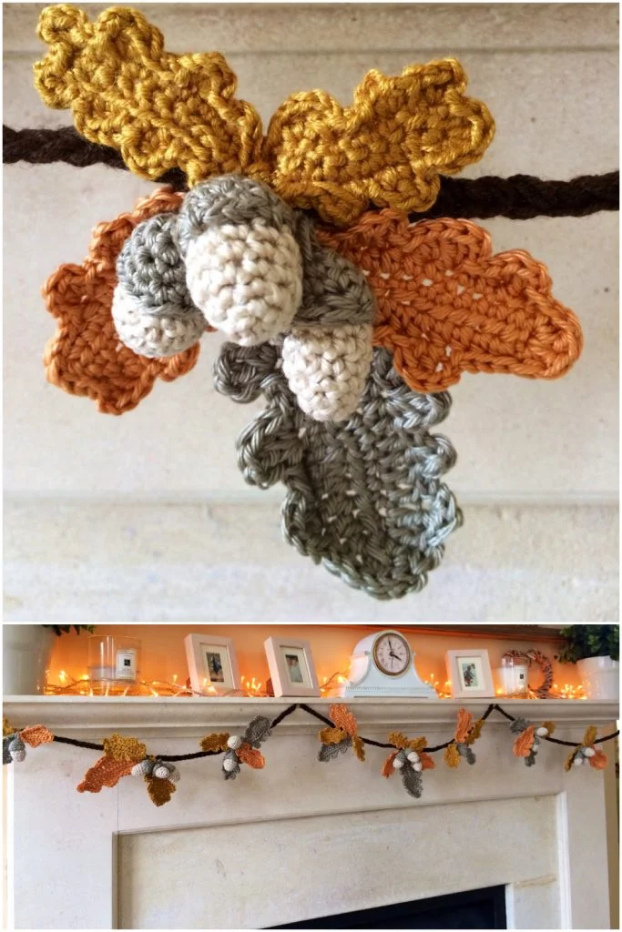 Crocheted garland with acorns and oak leaves in fall colors is draped across a mantel decorated with framed photos, a clock, and string lights, creating charming crochet decorations for fall.