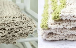 Two stacks of crocheted dishcloths in beige and white with green edges, echoing the intricate texture of a basketweave crochet blanket, are displayed on a pristine white surface.