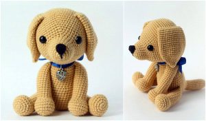A crochet dog plush, dubbed the "Lucky Puppy," boasts a blue ribbon and heart-shaped pendant, showcased from both front and side views.