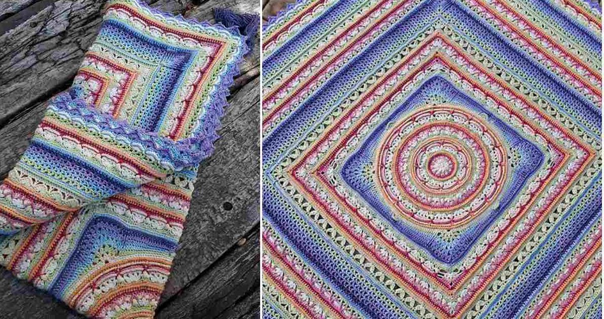 Close-up of the Lilliana Blanket with its multicolored crocheted design featuring striped, circular, and square patterns, displayed elegantly on a wooden surface.