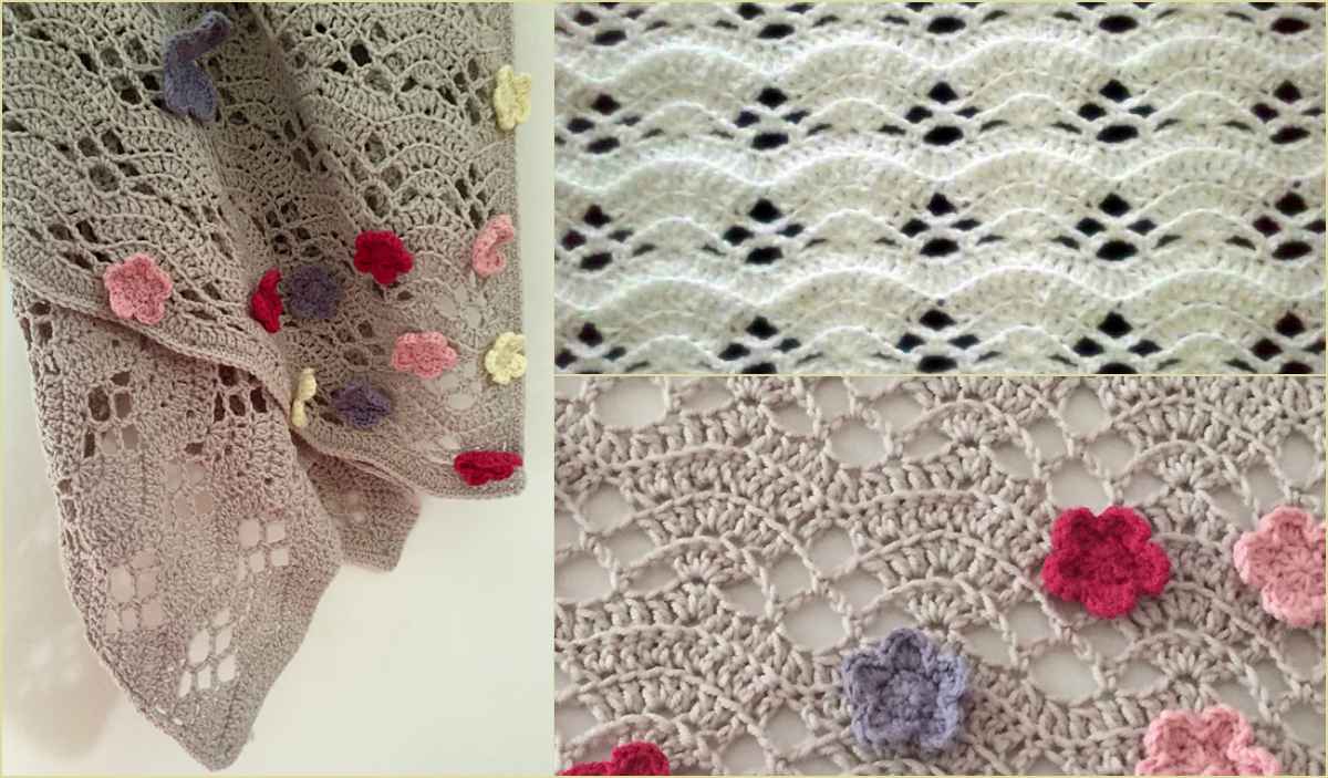 Crocheted lace shawl with floral patterns in pink, red, and purple. The beauty of close-up views showcases detailed lacework with interlocking loops and diamond shapes, almost like a delicate blanket draped in elegance.