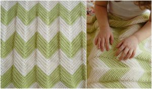 A child's hands gently rest on a green and white chevron baby blanket, crafted with care. The charming design could easily be replicated using a free pattern for those who appreciate the art of crochet.