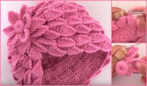 Pink beanie featuring a textured leaf design and a striking 3D flower, presented with two close-up images of the crochet process, perfect for fans of crochet tutorials.
