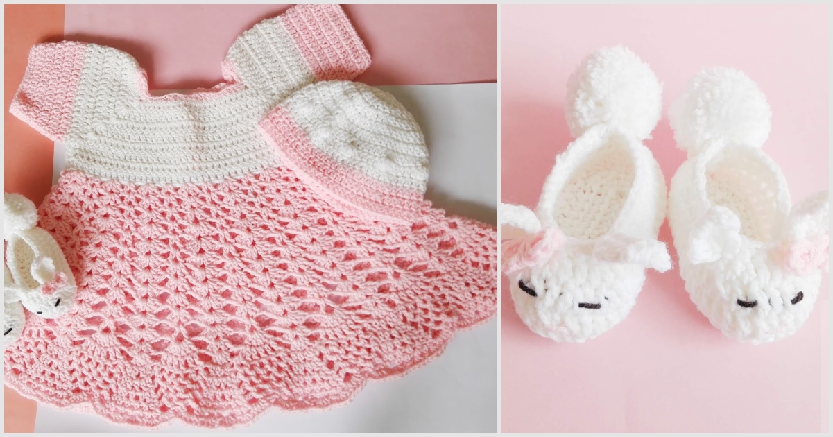 A crocheted pink and white baby dress with matching hat and shoes pairs perfectly with adorable white booties, featuring charming animal faces and bows. It's all beautifully displayed on a soft pink background, epitomizing charm in every stitch for your little one.