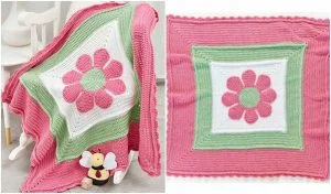 This adorable baby blanket features a pink flower design, draped over a chair next to a small plush bee toy, as if it's In Full Bloom.