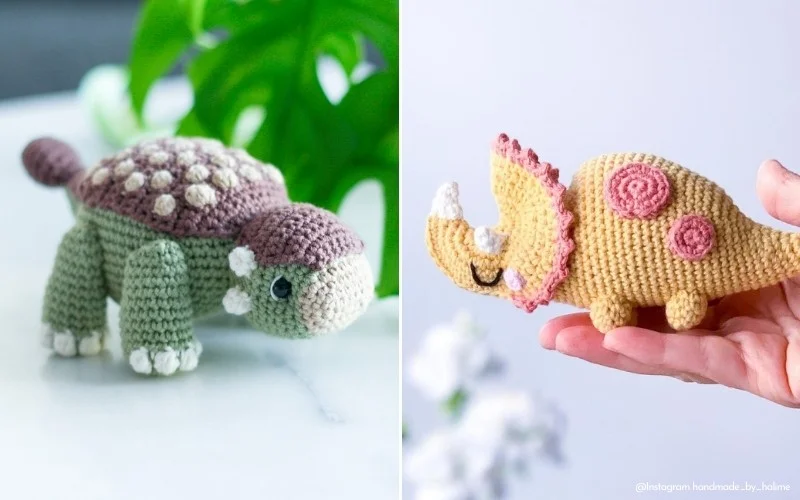 Two crochet dinosaur toys: a green and brown turtle-like creature on the left and a yellow triceratops on the right, held in a hand.