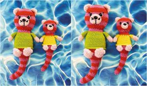 Two crocheted otters with pink heads and red-striped bodies, wearing green and yellow tops, lying on a blue wavy-patterned background—an otterly cute scene that showcases the delightful pattern of colors.