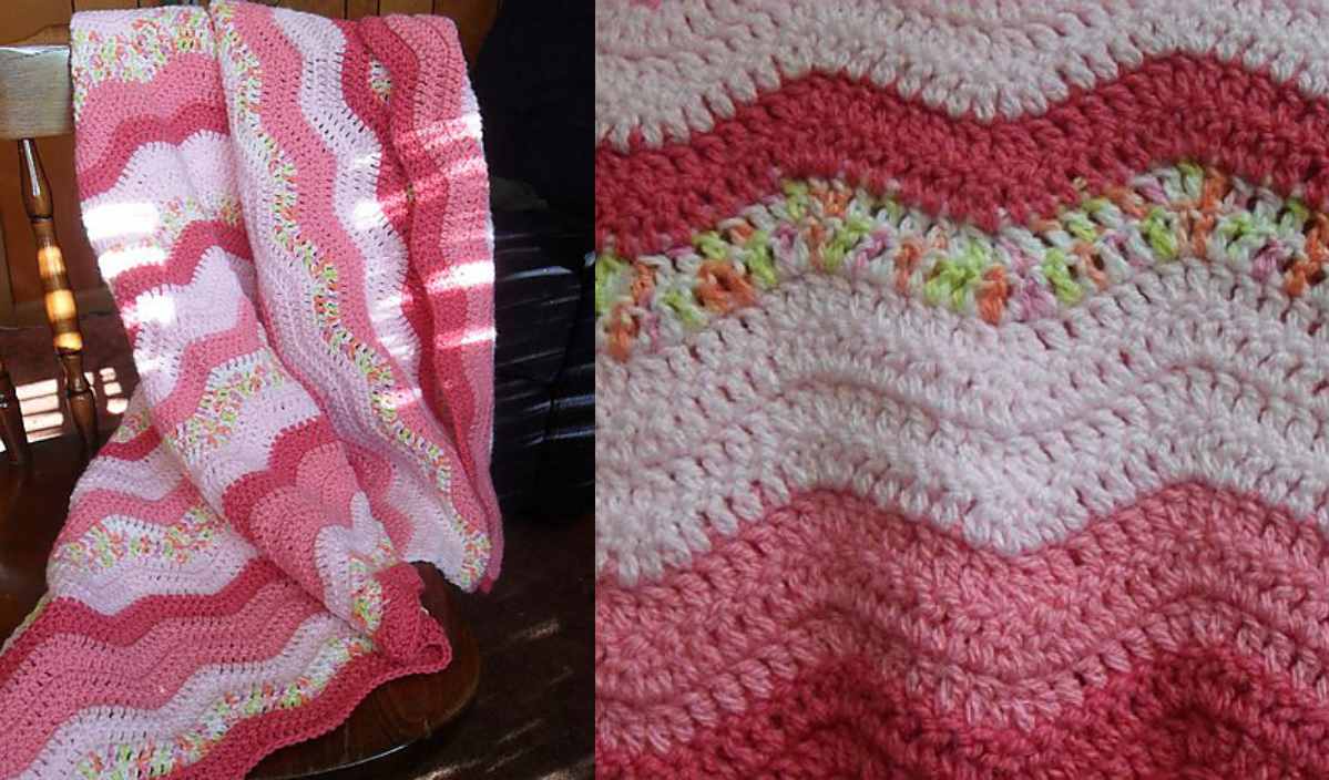 A handmade Neopolitan Ripple Blanket in shades of pink and white drapes elegantly over a wooden chair, showcasing its wavy beauty.