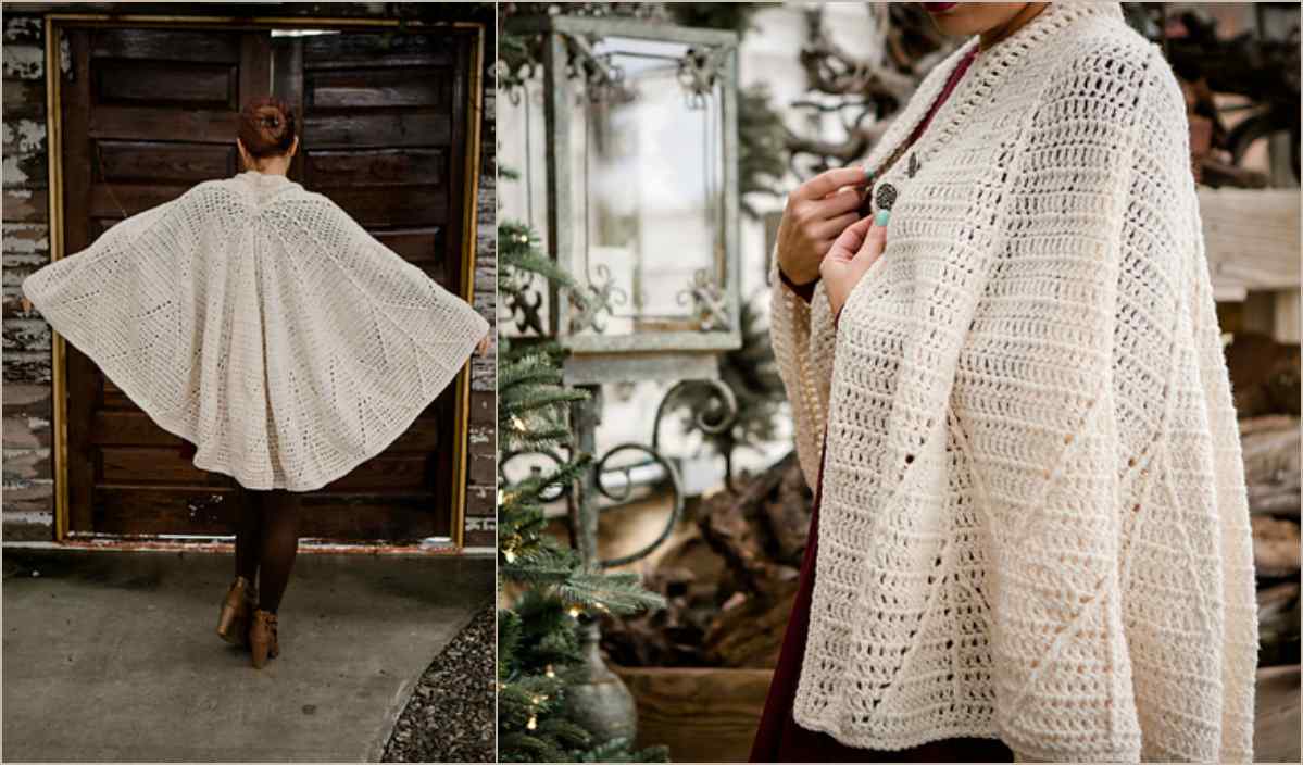 A woman showcases the Snow Charming Cape, a beautiful crochet pattern in neutral tones, as she stands by a wooden door and a decorated Christmas tree.