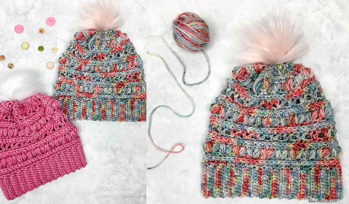 Crocheted multicolored slouchy hat with pom-pom, yarn ball, and a pink textured crocheted "Love Bug" hat with buttons on a light background.