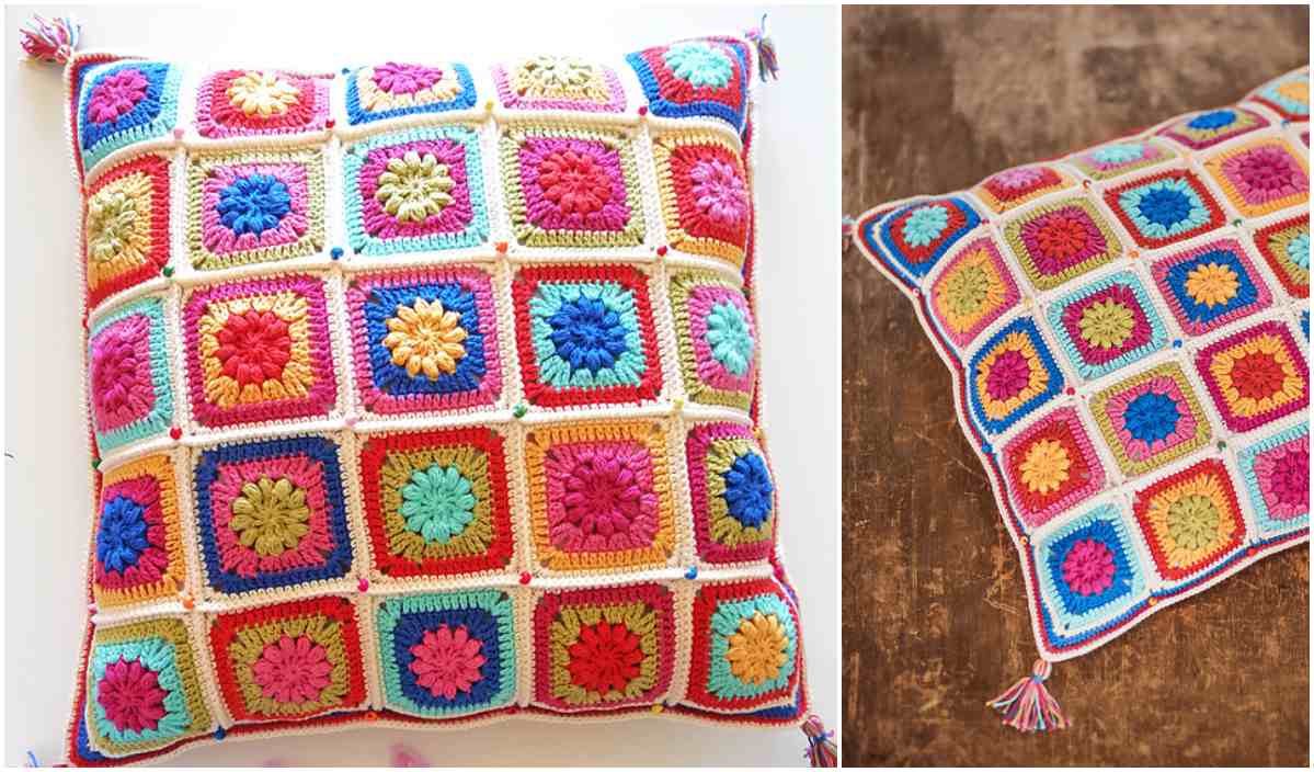 Colorful crocheted pillows with square patterns and tassels on each corner; the crochet pattern in each square features a different vibrant flower-like design.