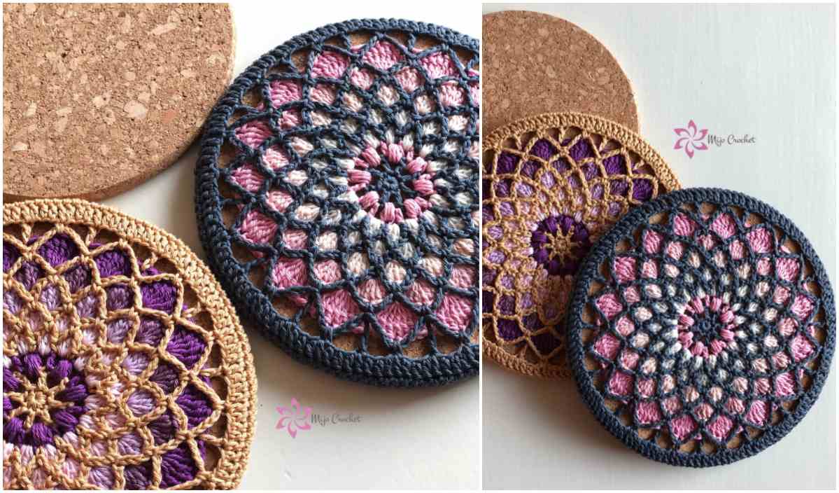 Two crochet coasters with intricate patterns in pink, blue, and purple tones are displayed alongside plain cork coasters. Their design is reminiscent of stripy heart motifs often found in free crochet patterns.