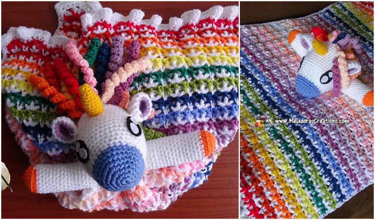 Unveil the charm of a unicorn lovey blanket, featuring a dazzling rainbow crochet pattern and an adorable stuffed unicorn head, all beautifully showcased on a rustic wooden surface.