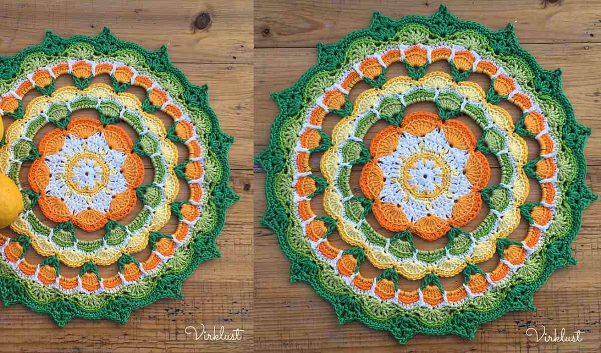 Two colorful Citrus Mandala Doilies with concentric patterns in green, orange, yellow, and white grace a wooden surface. A lemon rests on the left doily. Explore how to make your own inspired by a free crochet pattern.