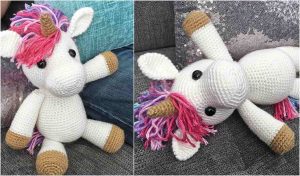 Meet Jazzy the Unicorn, a crocheted plush with a pink mane and white body. Perched on a gray couch, one image captures Jazzy seated gracefully while another showcases it lying on its back. Get inspired to create your version with our free crochet pattern.