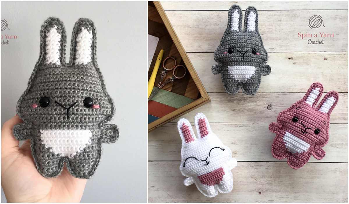 Three crocheted bunny toys in gray, white, and pink are displayed on a wooden surface, with a hand holding the gray one. A box with sewing tools is partially visible, hinting at the creative joy that comes from following a free crochet pattern.