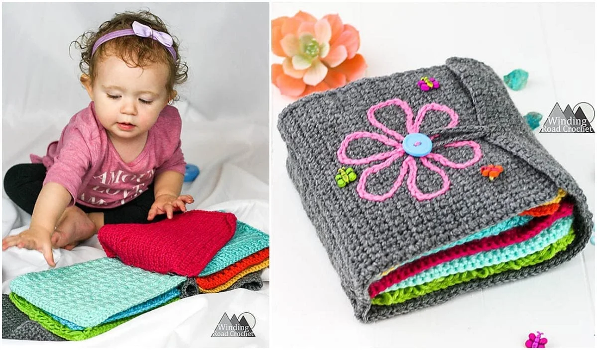 A baby reaches for colorful crochet squares while admiring the intricate patterns. Next to the baby, a folded gray crocheted item with a pink flower design and button accents rests, reminiscent of elegant wavy throws.