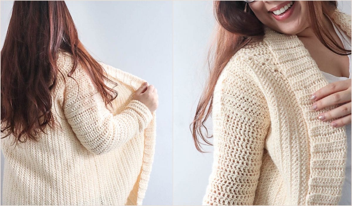 A person modeling a cream-colored, knitted cardigan, revealing the intricate Wheel Flower design on the back and offering a close-up of the textured knit.