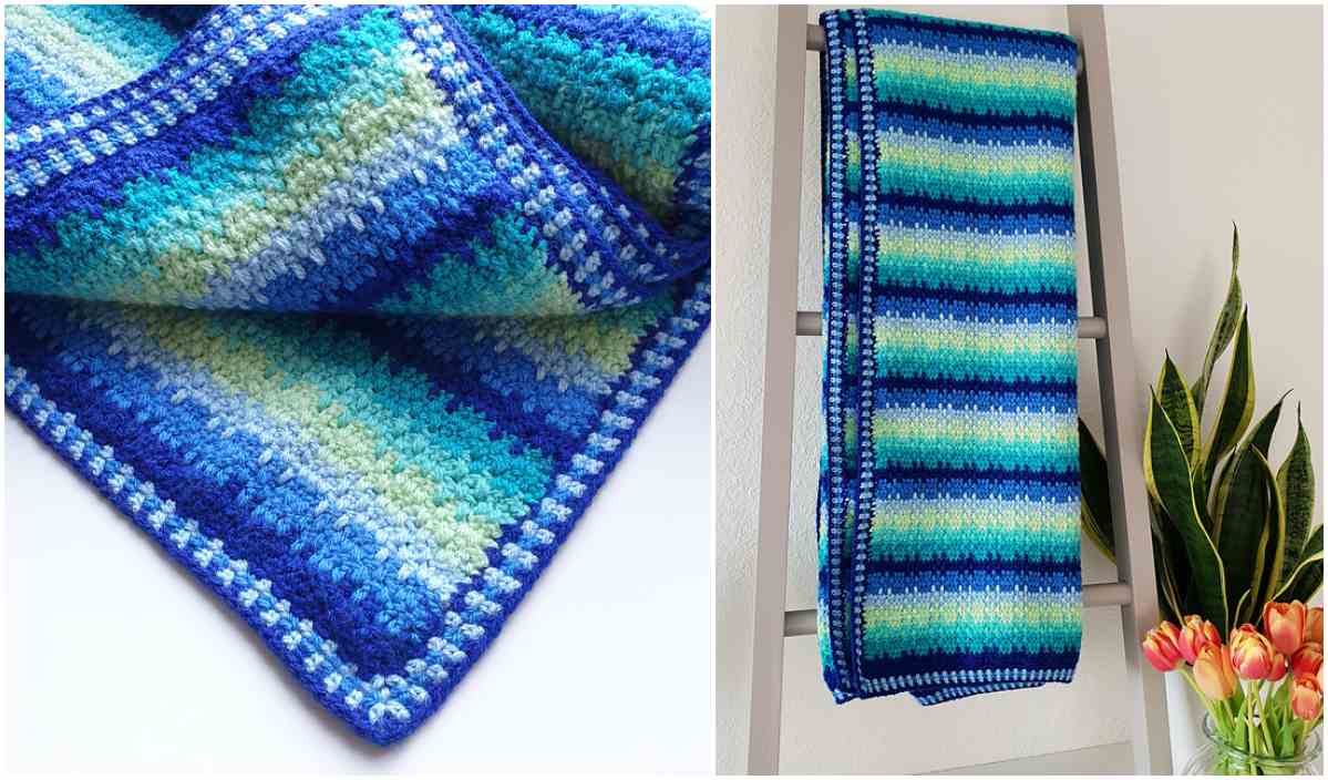 A beautifully crocheted blue and green Spoke Flower Blanket with striped patterns is draped over a ladder.