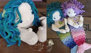 Two crocheted amigurumi mermaid dolls lie on a wooden surface, showcasing their multicolored yarn hair and textured tails.