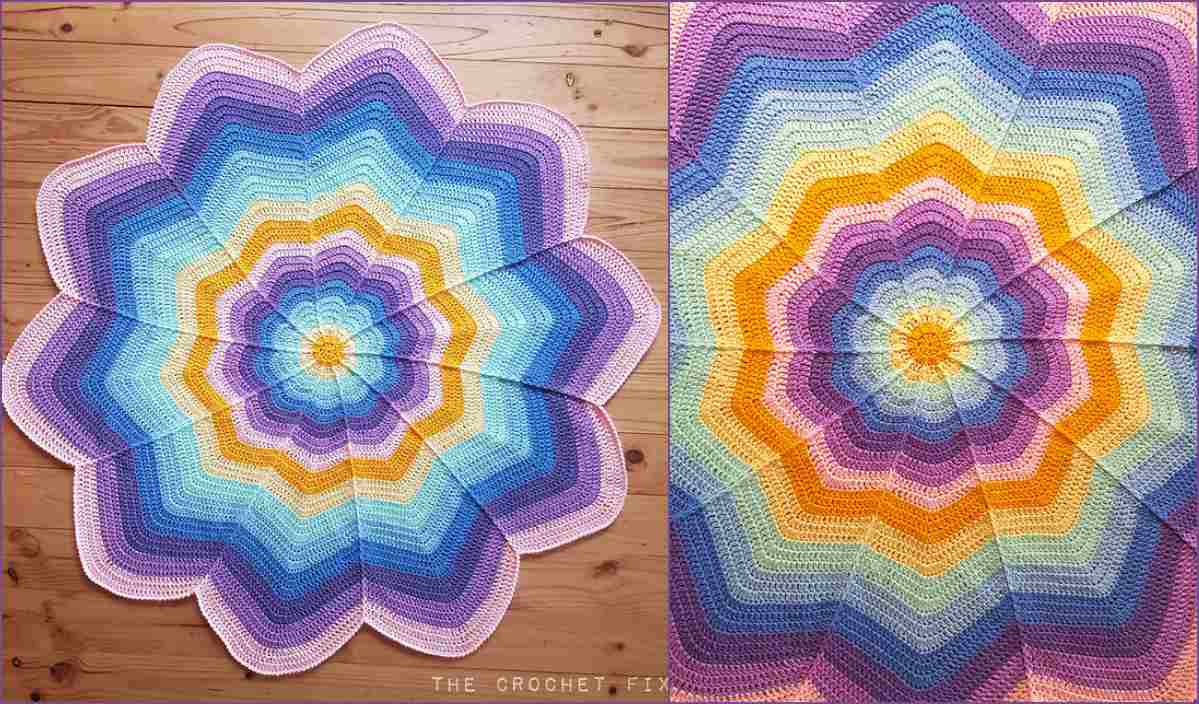 Colorful crochet star-shaped blanket with gradient stripes in blue, purple, yellow, and pink on a wooden floor—an exquisite example of a flower blanket.