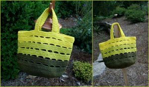 A handmade crocheted tote bag with green and yellow stripes, reminiscent of a Waldo's Puzzle Afghan, displayed outdoors.