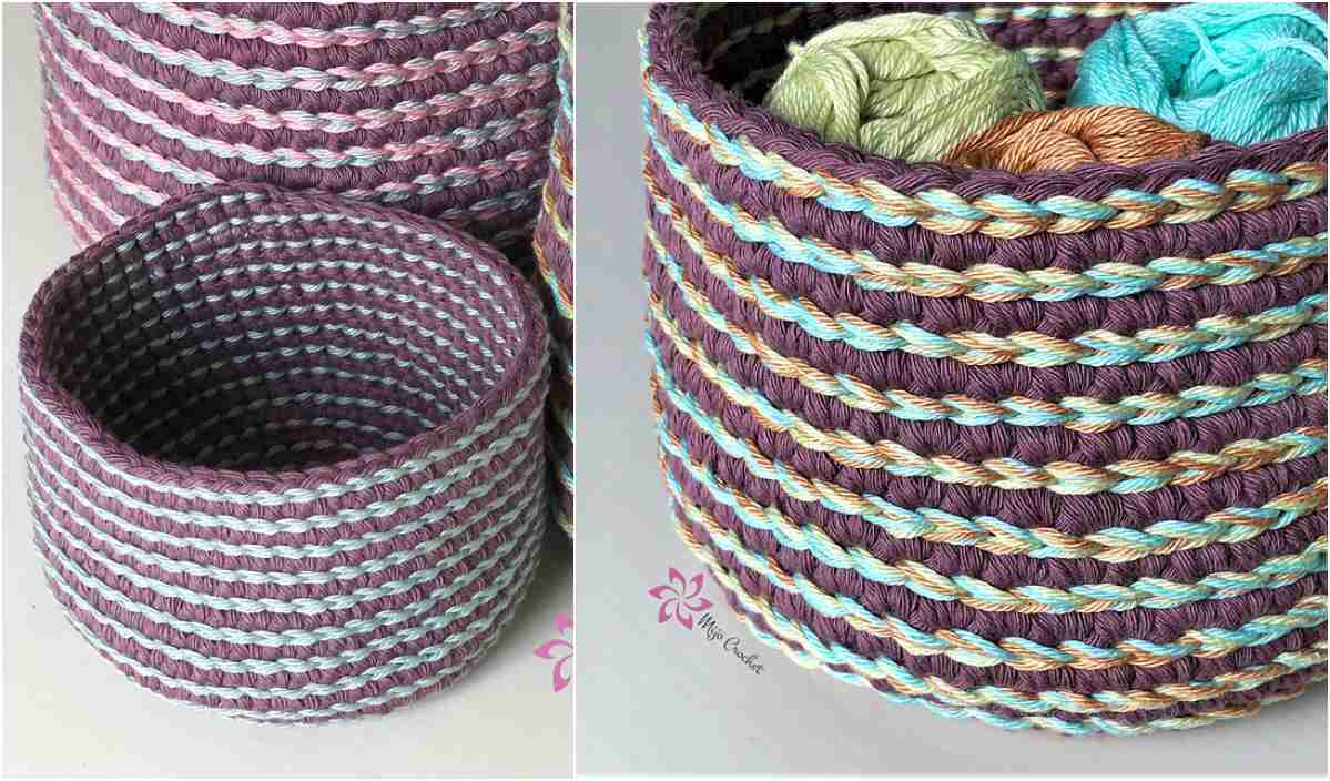 Close-up of crocheted Perfect Whirl Baskets in shades of purple, blue, and beige, with colorful yarn balls nestled inside one basket.