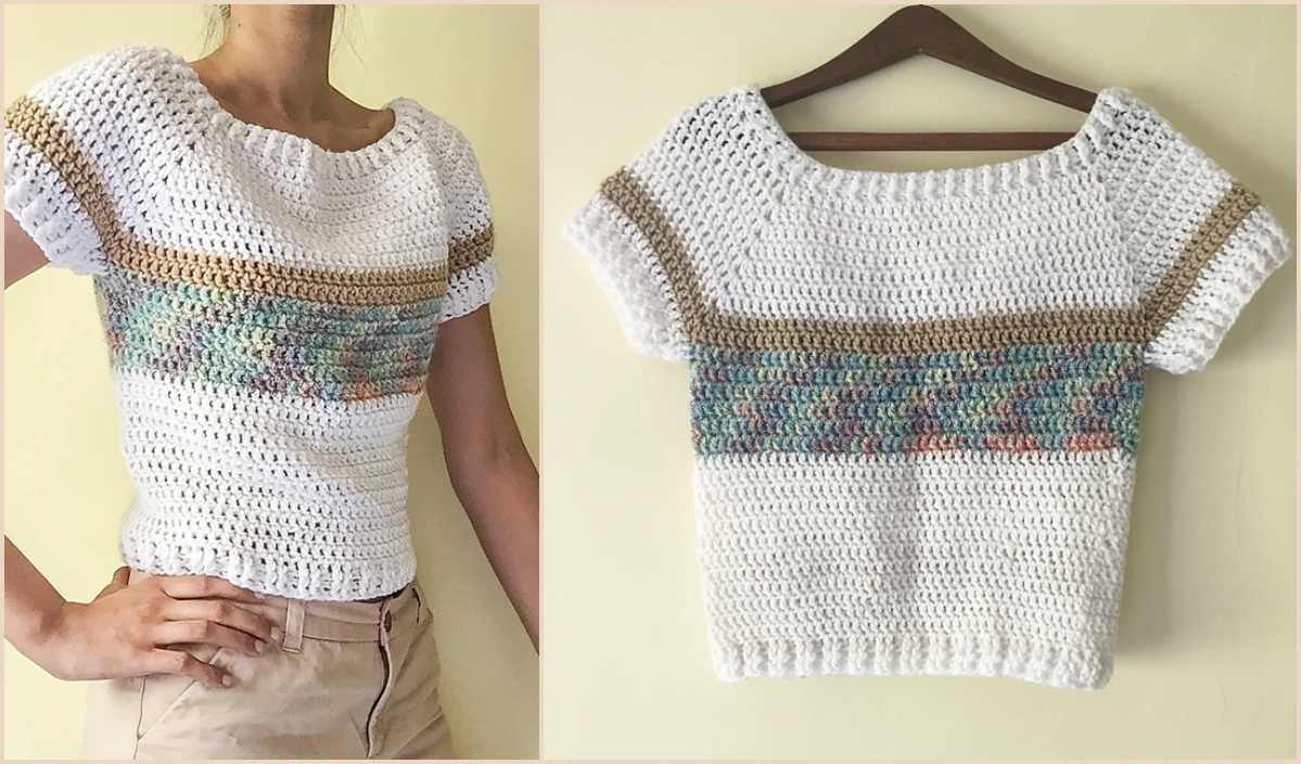 This crochet top, displayed on a person and a hanger, features a white base with a colorful middle stripe and tan accents. Perfectly crafted from a free crochet pattern, it's as delightful as watching bunnies hop around in springtime.