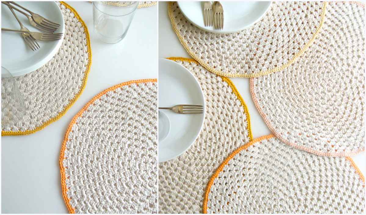 Crocheted round placemats in cream with colored edges, resembling a cozy tabby chic cat bed, are artfully arranged under plates and flatware on a white table.