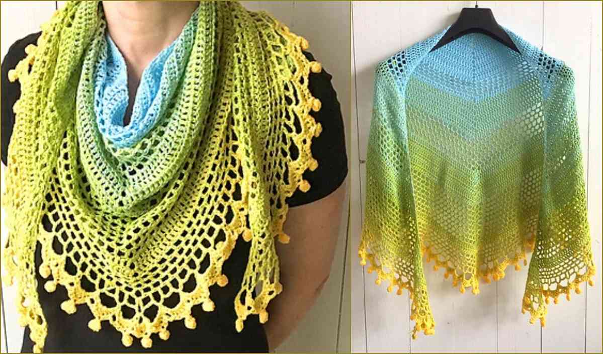 Two multicolored crocheted shawls displayed: one worn around shoulders and the other hanging. Both feature intricate lace patterns and bright gradient colors, inspired by a free crochet pattern.