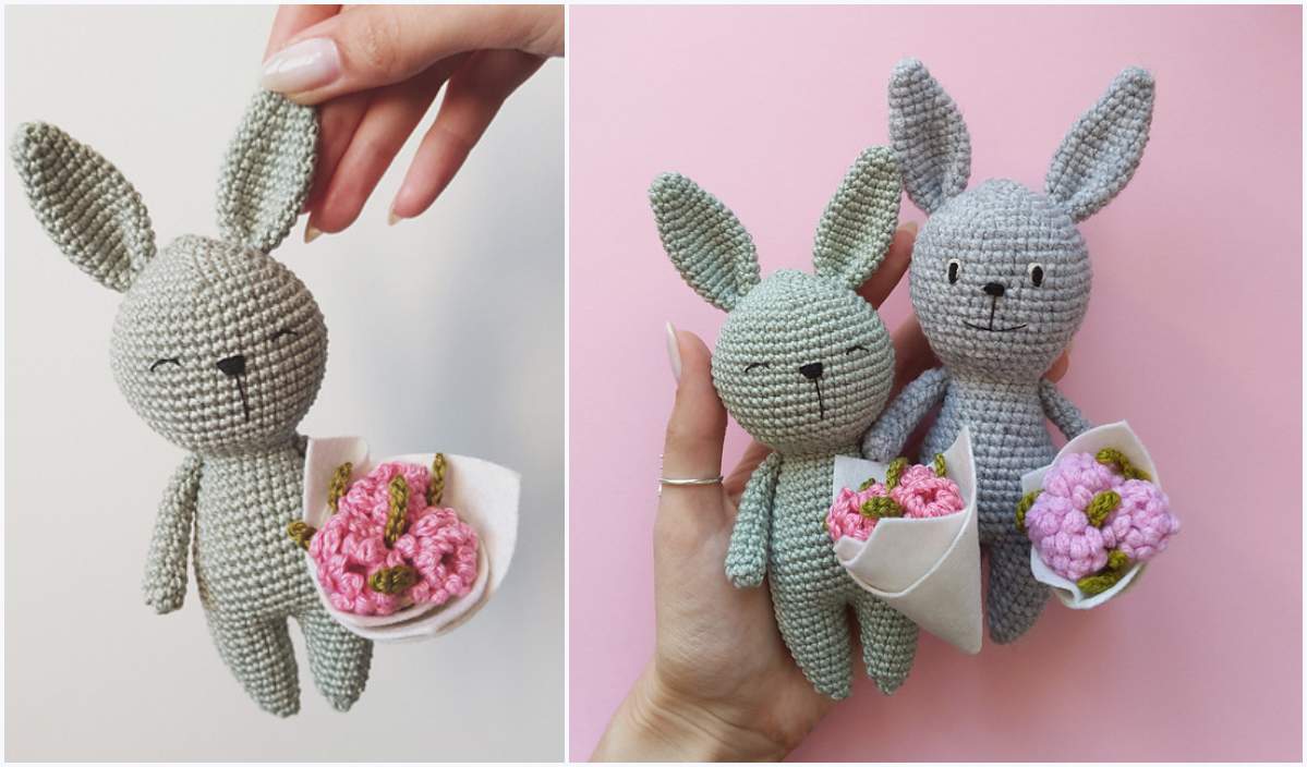 Two crocheted birthday bunnies, one gently held by a hand, each clutching small bouquets of pink flowers. Pale pink background adds charm to this adorable crochet pattern scene.