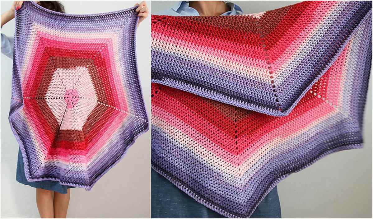 A person holds a multicolored, star-shaped crochet blanket in shades of purple, pink, and red, crafted from a delightful free pattern.