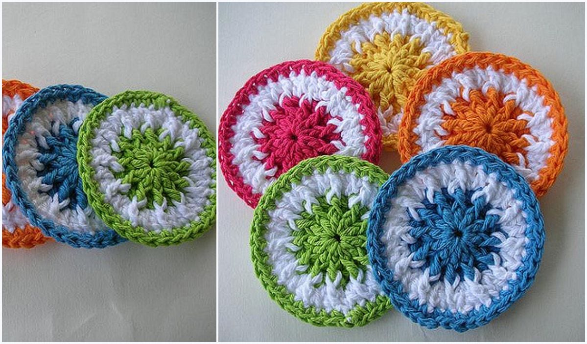 Colorful crocheted coasters with circular patterns, featuring vibrant Scrubbie Dots in green, blue, pink, orange, and yellow tones, displayed on a light background.