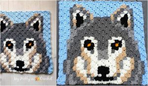 This Ferris Square crochet pattern features a detailed depiction of a wolf's face, beautifully bordered with blue. Perfect for adding a touch of wilderness to your creations.