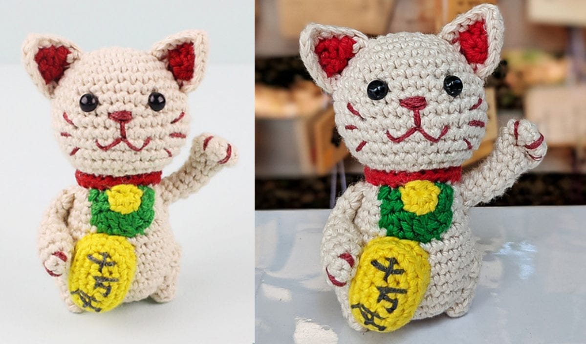 Crocheted Lucky Cat figurine with red ears, a yellow bib, and a raised paw in two similar images.