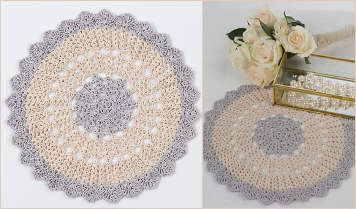 A round crochet doily in beige and gray patterns showcases its intricate crochet pattern, elegantly displayed alone alongside a bouquet of white roses.