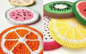 These delightful crocheted coasters, inspired by fruit crochet ideas, showcase vibrant slices of orange, watermelon, lemon, and kiwi beautifully arranged on a surface.
