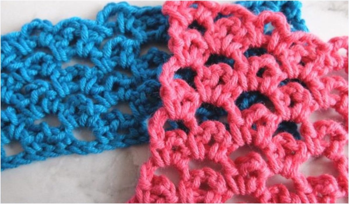 Two tiny crochet lace patterns, one in blue and the other in pink, placed side by side on a light surface, exude a cute charm reminiscent of amigurumi designs.