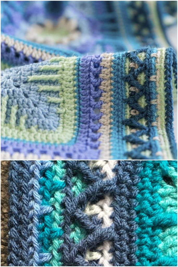 Close-up of a multicolored crocheted blanket featuring blue, green, and beige yarn with intricate stitch patterns and textures, beautifully finished with a detailed crochet blanket border.