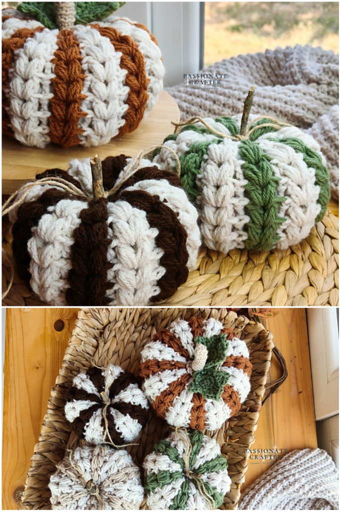Handmade crocheted pumpkins in various sizes and colors, featuring striped patterns in white, brown, orange, and green, displayed on a woven mat and wooden surface near a windowโperfect for cozy decor or as inspiration from magazine@yourcrochet.com.