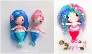 Three crocheted mermaid dolls with colorful hair and tails enchant the scene—two flaunting blue and pink locks on the left, while the one on the right dazzles with multicolored strands. They elegantly recline among small shells, perfect for those seeking whimsical crochet patterns.