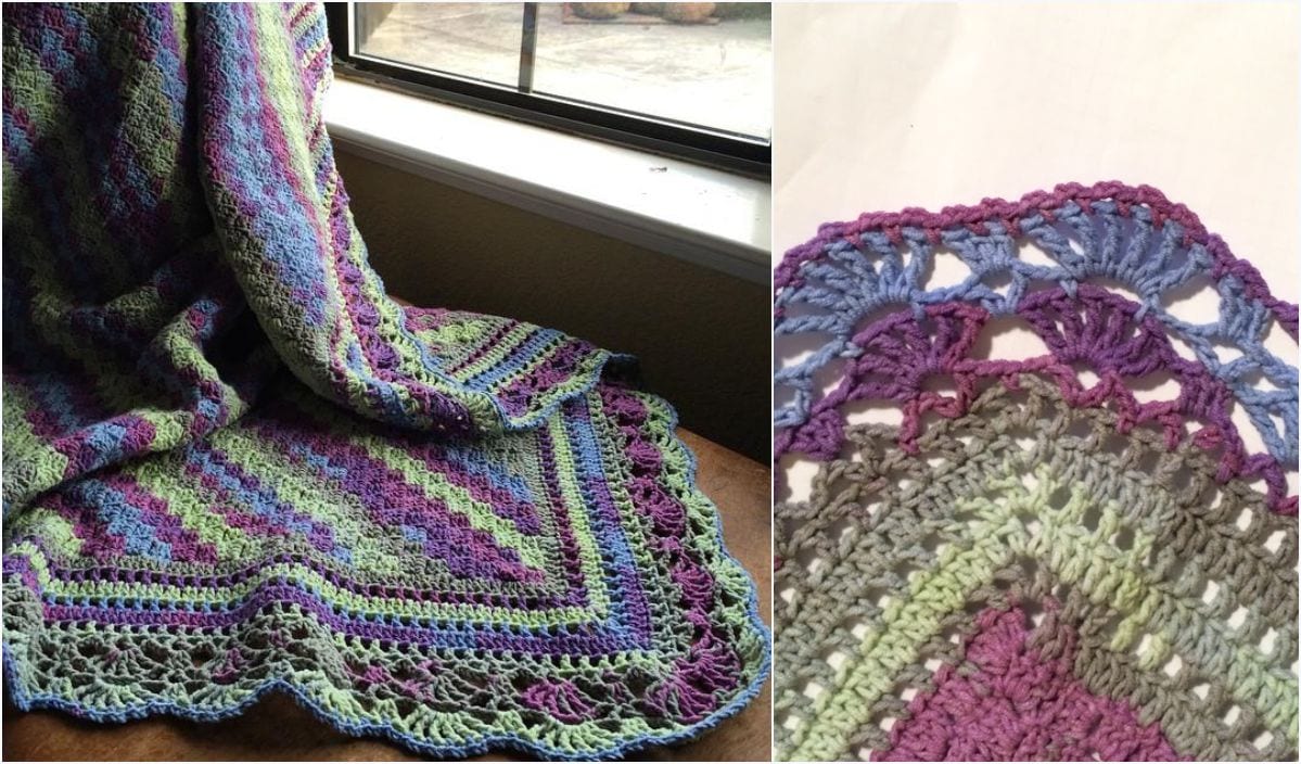 A colorful crochet blanket with green, purple, and blue patterns is draped over a chair by a window. The intricate border reflects classic crochet patterns in every stitch.