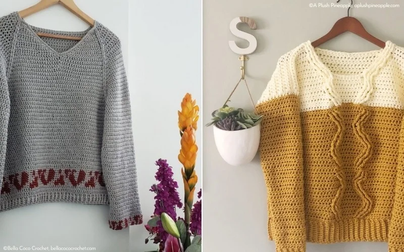 Two crochet pullovers hang on display. The left features a gray base with a striking red pattern, while the right showcases mustard and white hues with textured stripes. Both are elegantly presented against a light-colored wall adorned with plants.