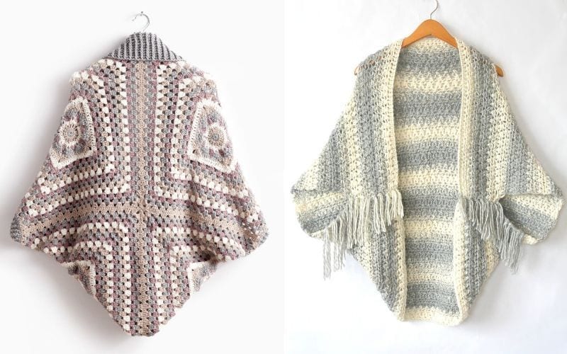 Two cosy crochet cardigans are displayed: the left features a square pattern in neutral tones, while the right showcases a cocoon-style striped gray and cream design with fringes. Both hang elegantly on hangers, inviting warmth and comfort.