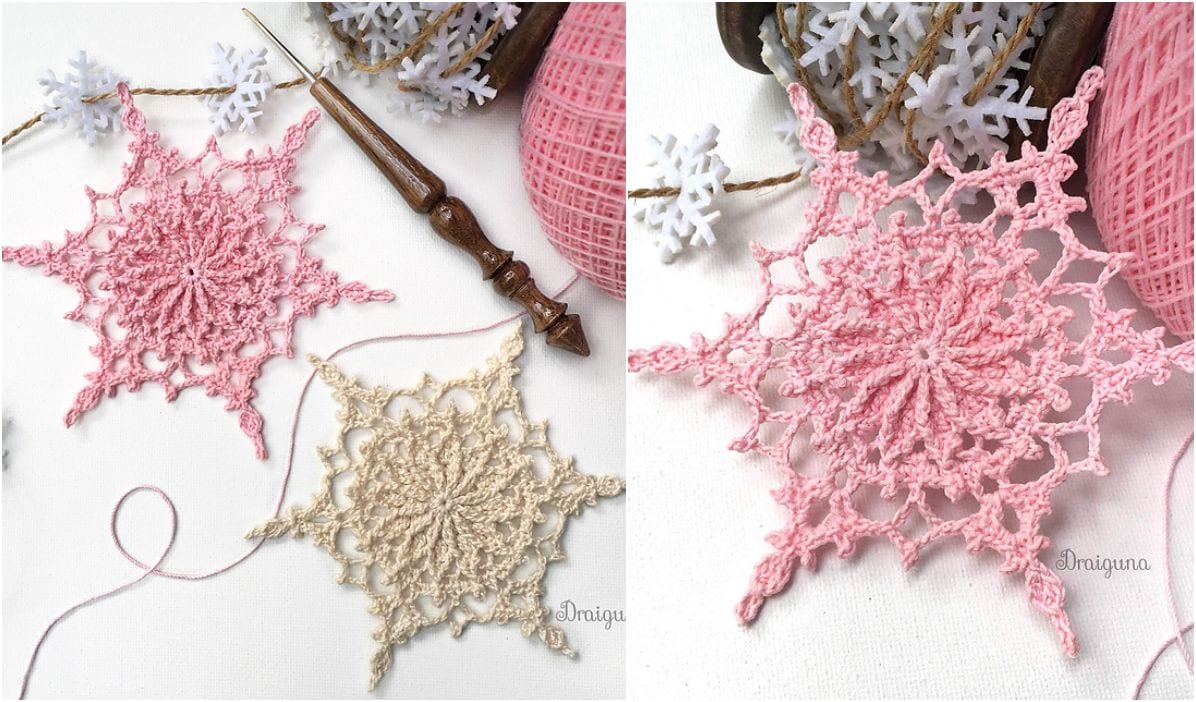 Two crochet snowflakes in pink and beige are artfully displayed on a flat surface, surrounded by crochet tools and yarn, reminiscent of the intricate patterns found in a Larksfoot Stitch Blanket.