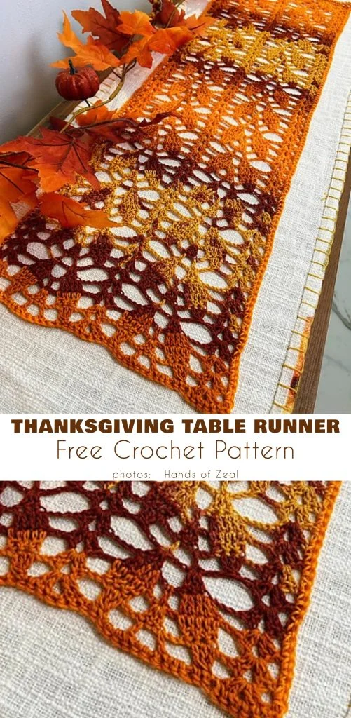 Crocheted table runner in orange, gold, and brown autumn colors on a beige cloth, with artificial fall leaves, a small pumpkin, and an amigurumi turkey nearby.