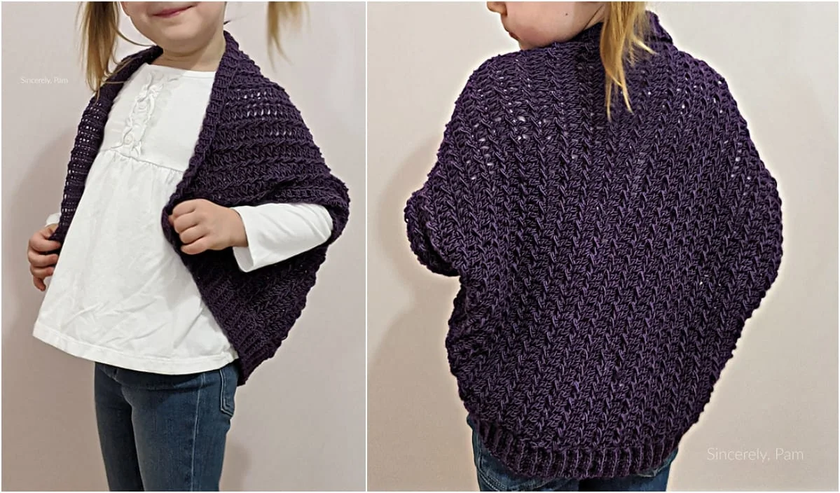 A child is modeling a purple crocheted shrug over a white shirt and jeans, elegantly showcasing both the front and back views.