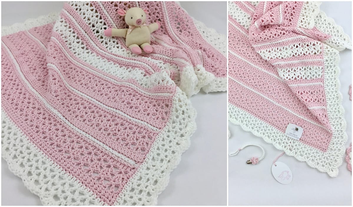 A pink and white crocheted baby blanket with a teddy bear beside it, showcasing intricate crochet patterns and an elegant shell edging.