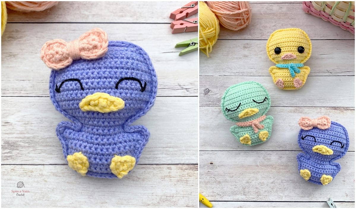 Crocheted plush toys: a delightful purple duckling with a pink bow, a cheerful yellow duck, and an adorable green duck with a blue bow, all arranged on a wooden surface. Perfect inspirations for free crochet patterns.